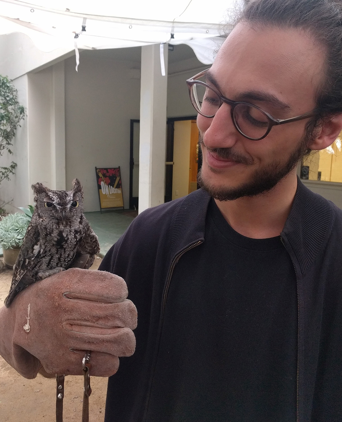 Picture of Deniz Korman with owl
