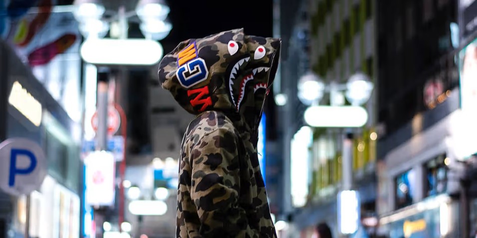 man wearing Bape in a city