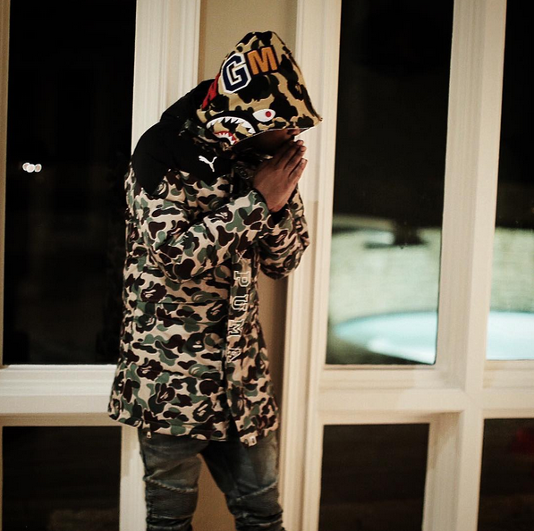 Future wearing green Bape camo jacket