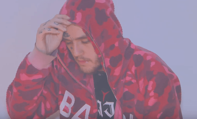 Lil Peep wearing red Bape Camo full zip hoodie