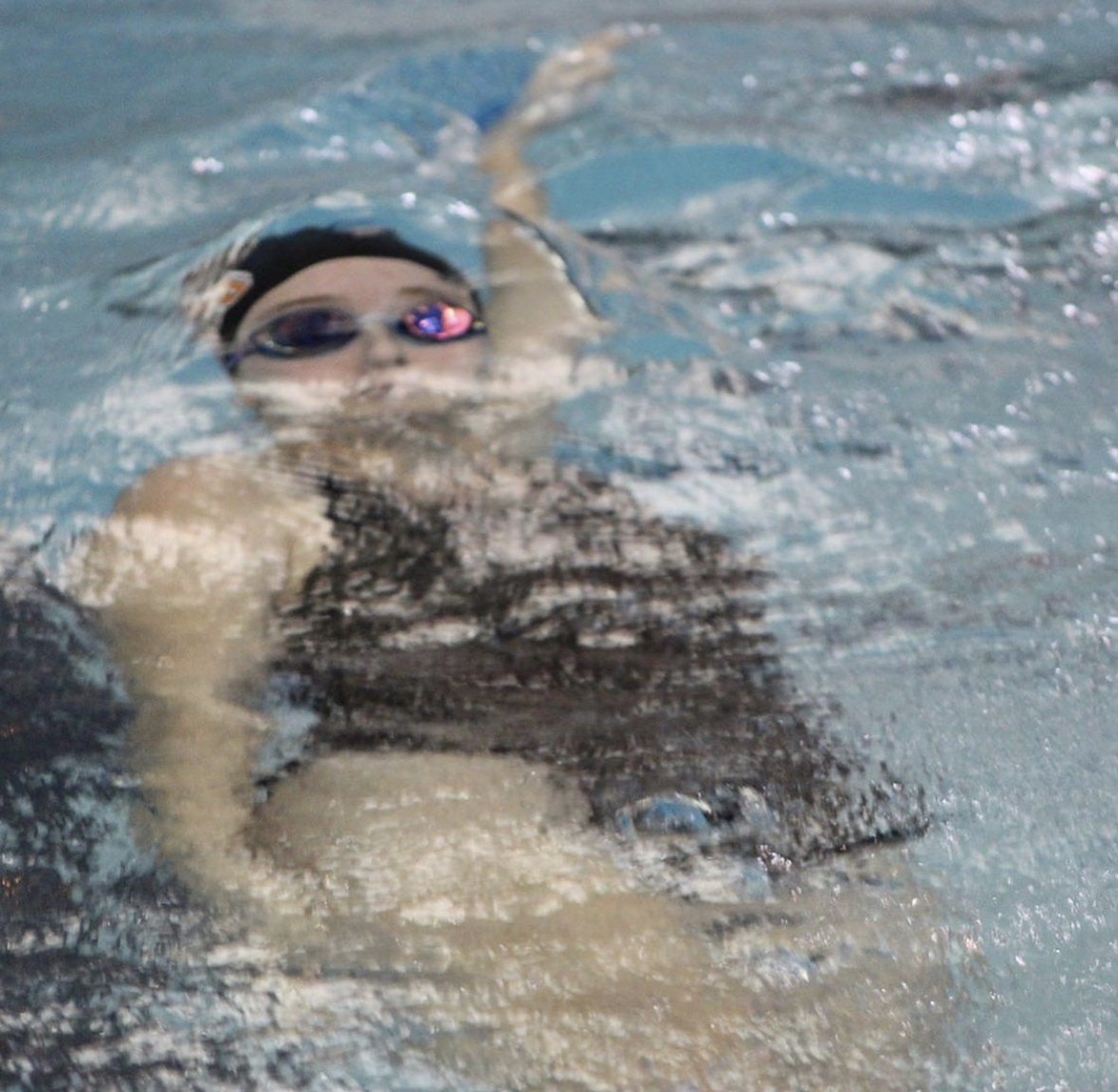 swimmer about to break surface